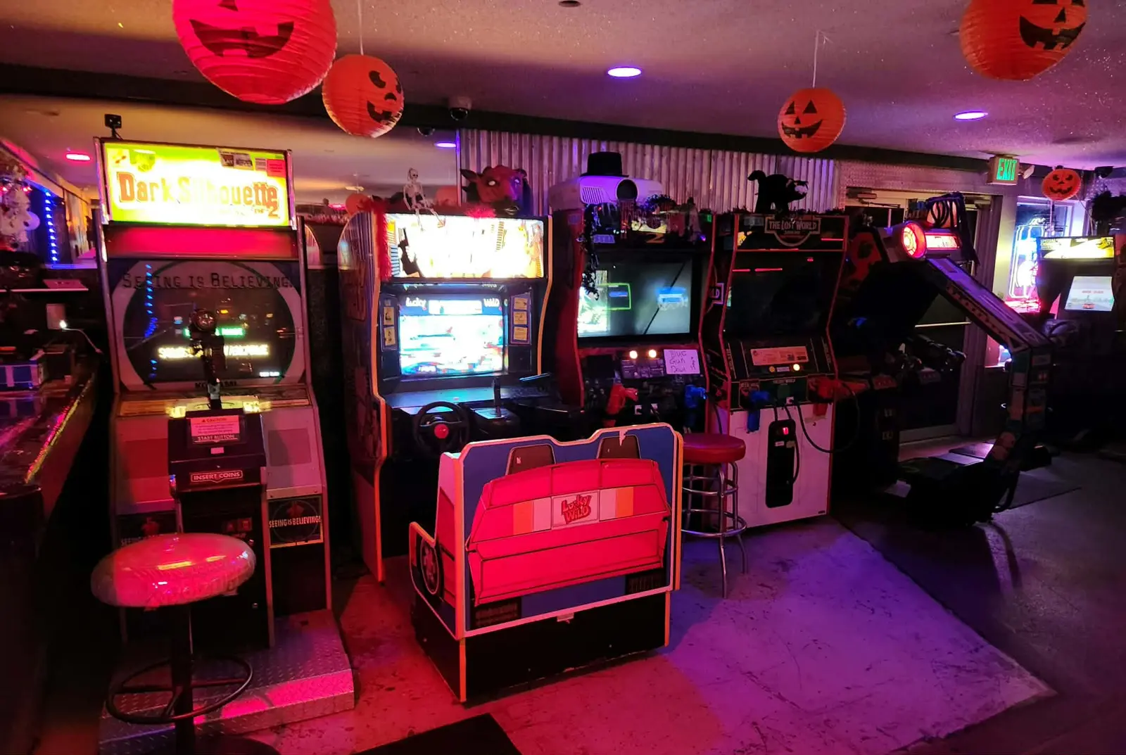 Light-gun row with Silent Scope 2, Lucky & Wild, House of the Dead 2 and The Lost World